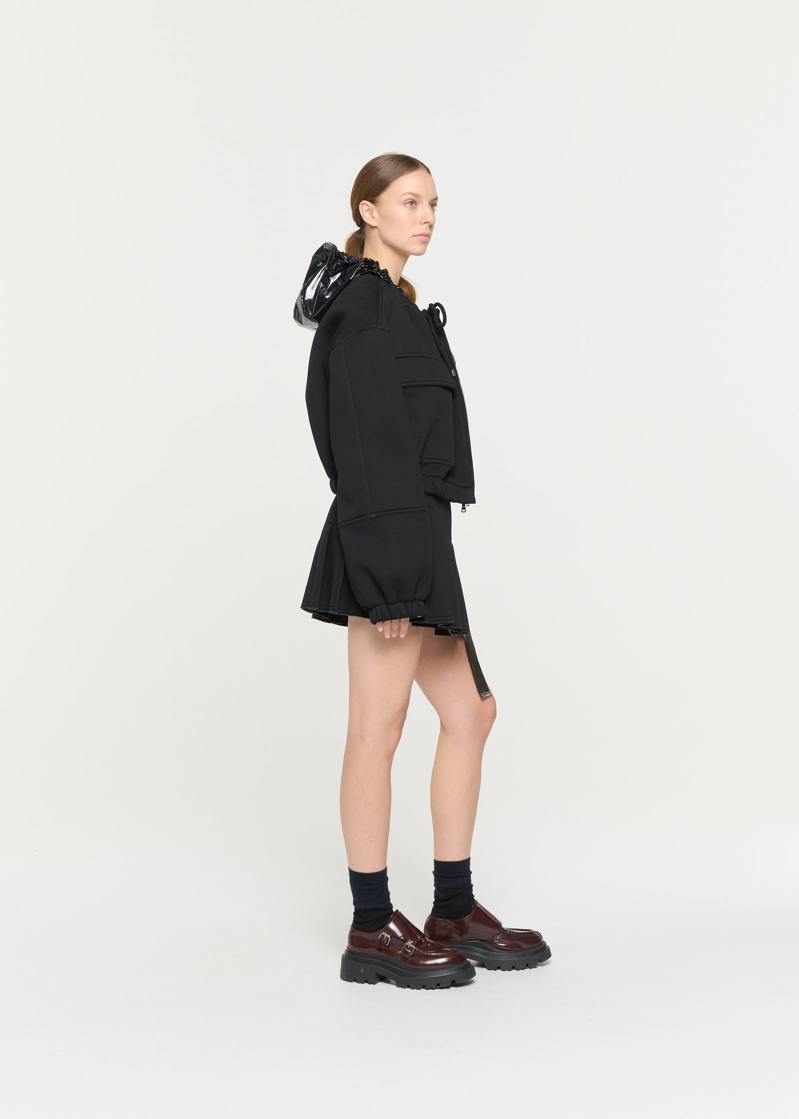 BLACK SCUBA MINI PLEATED SKIRT