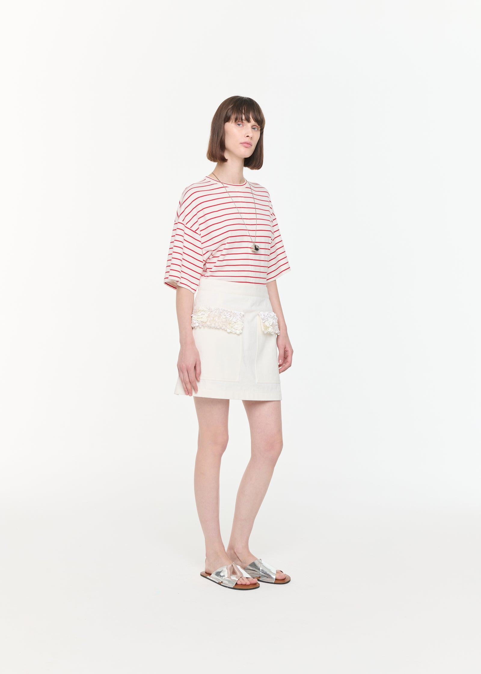 WHITE DRILL MINI SKIRT WITH SEQUINS