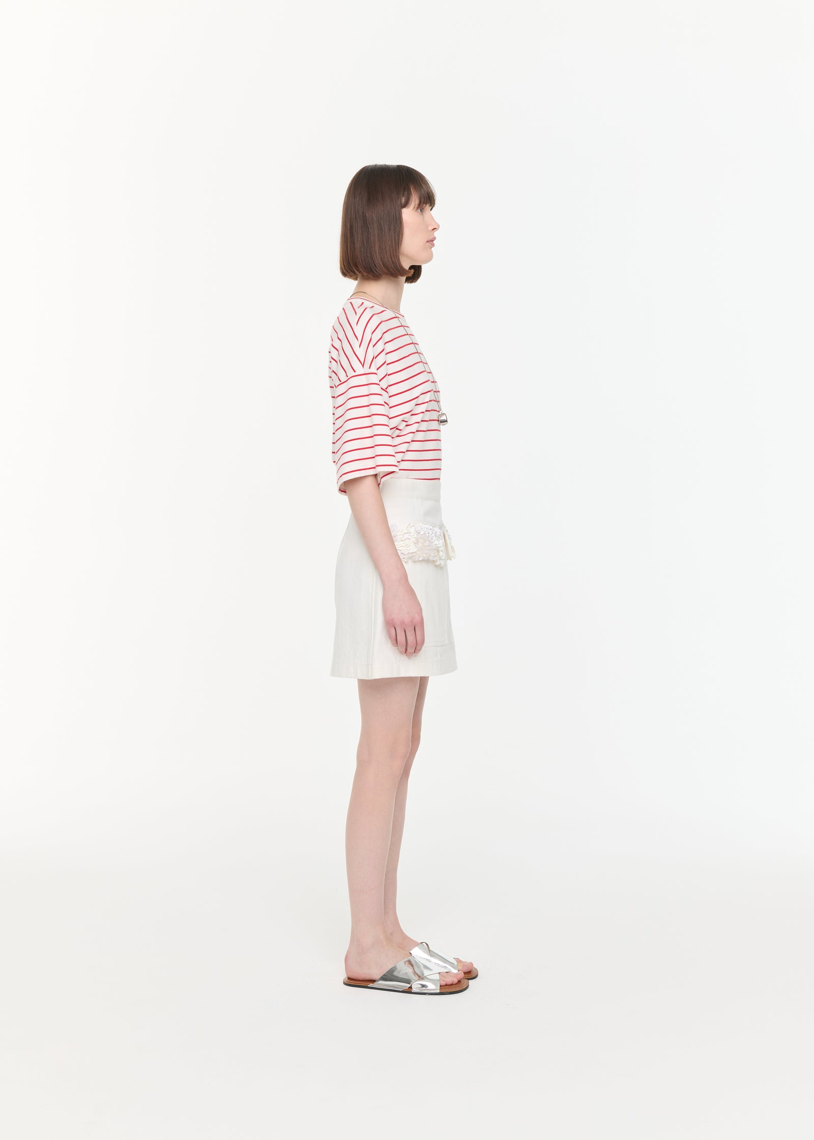 WHITE DRILL MINI SKIRT WITH SEQUINS