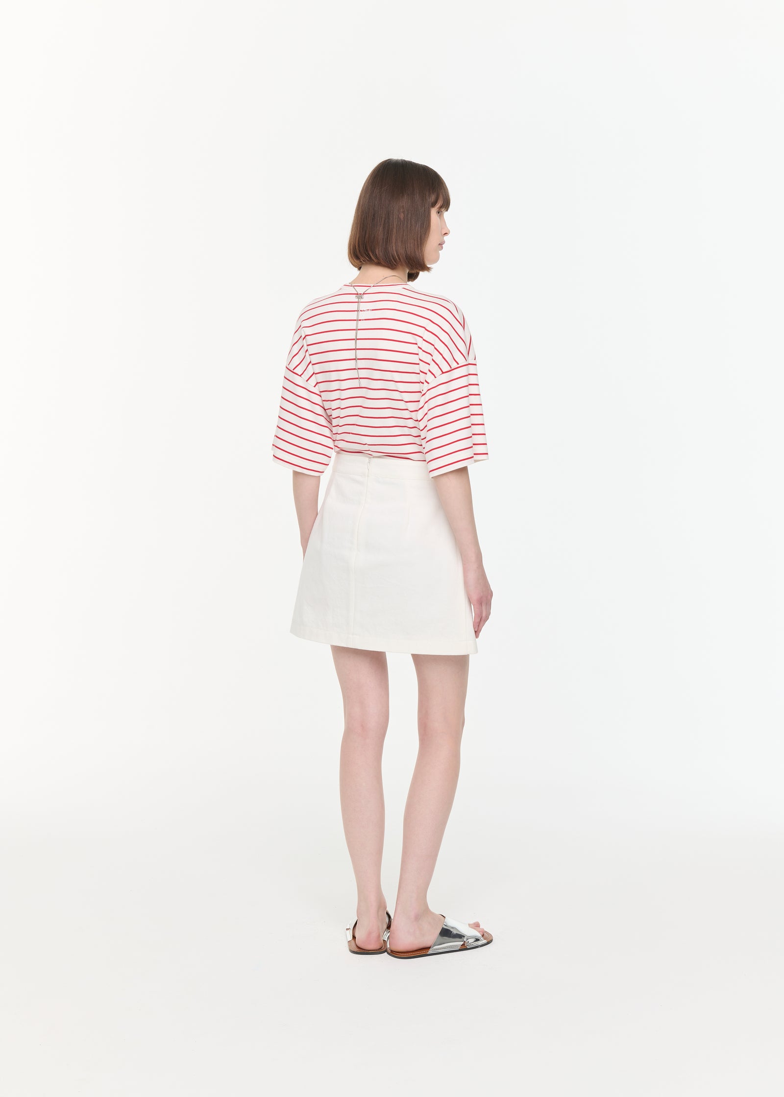 WHITE DRILL MINI SKIRT WITH SEQUINS