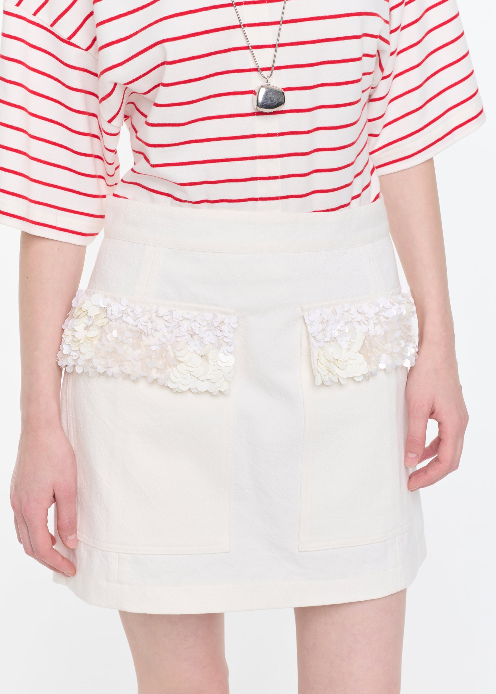 WHITE DRILL MINI SKIRT WITH SEQUINS