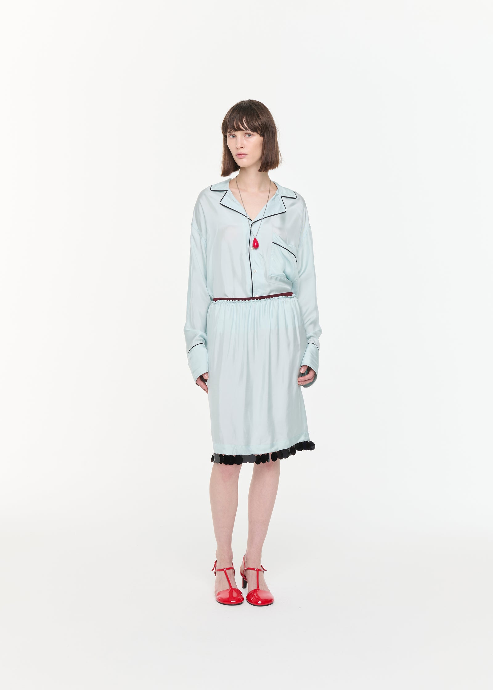 LIGHT BLUE MIDI SKIRT WITH SEQUIN HEM