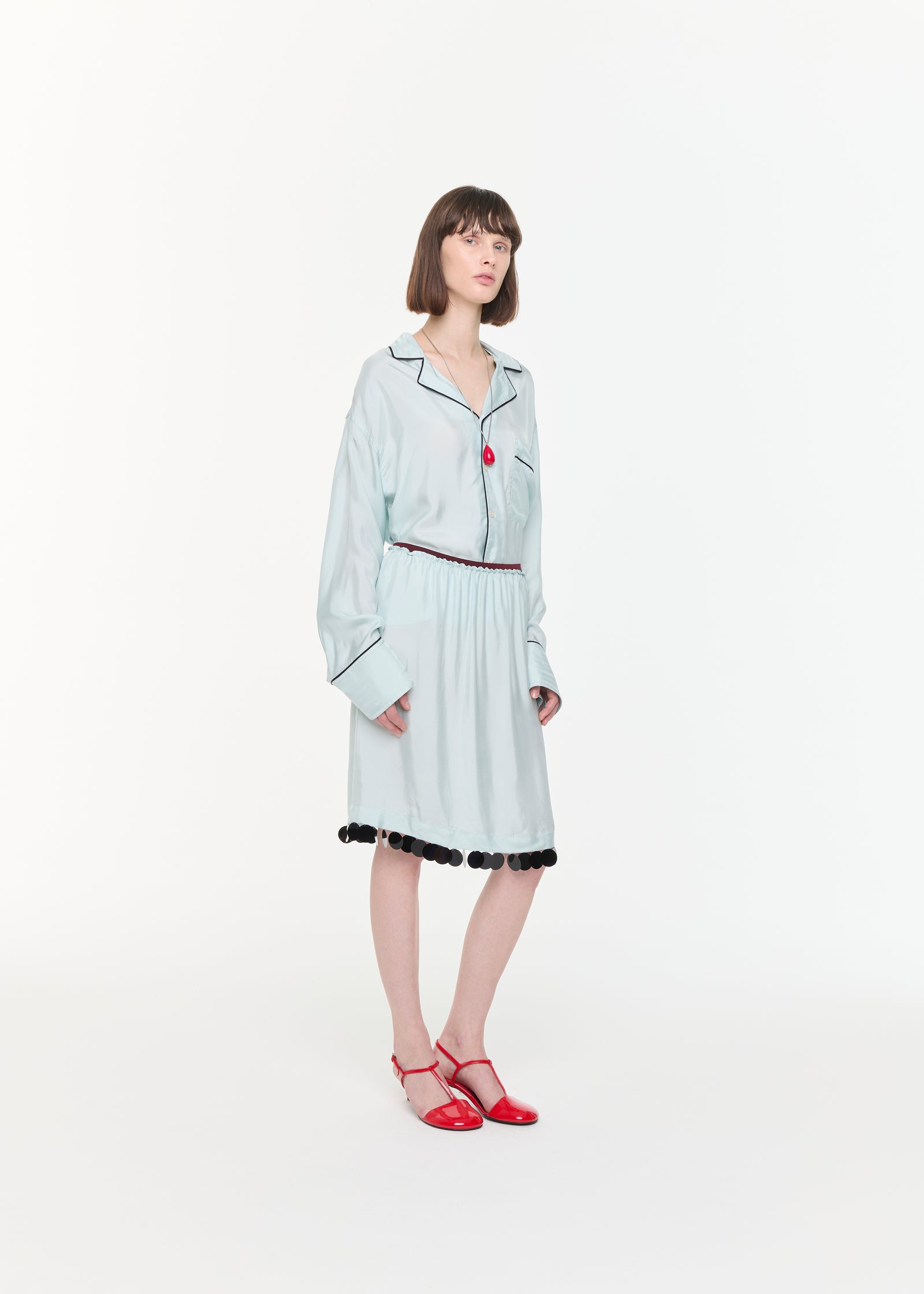 LIGHT BLUE MIDI SKIRT WITH SEQUIN HEM