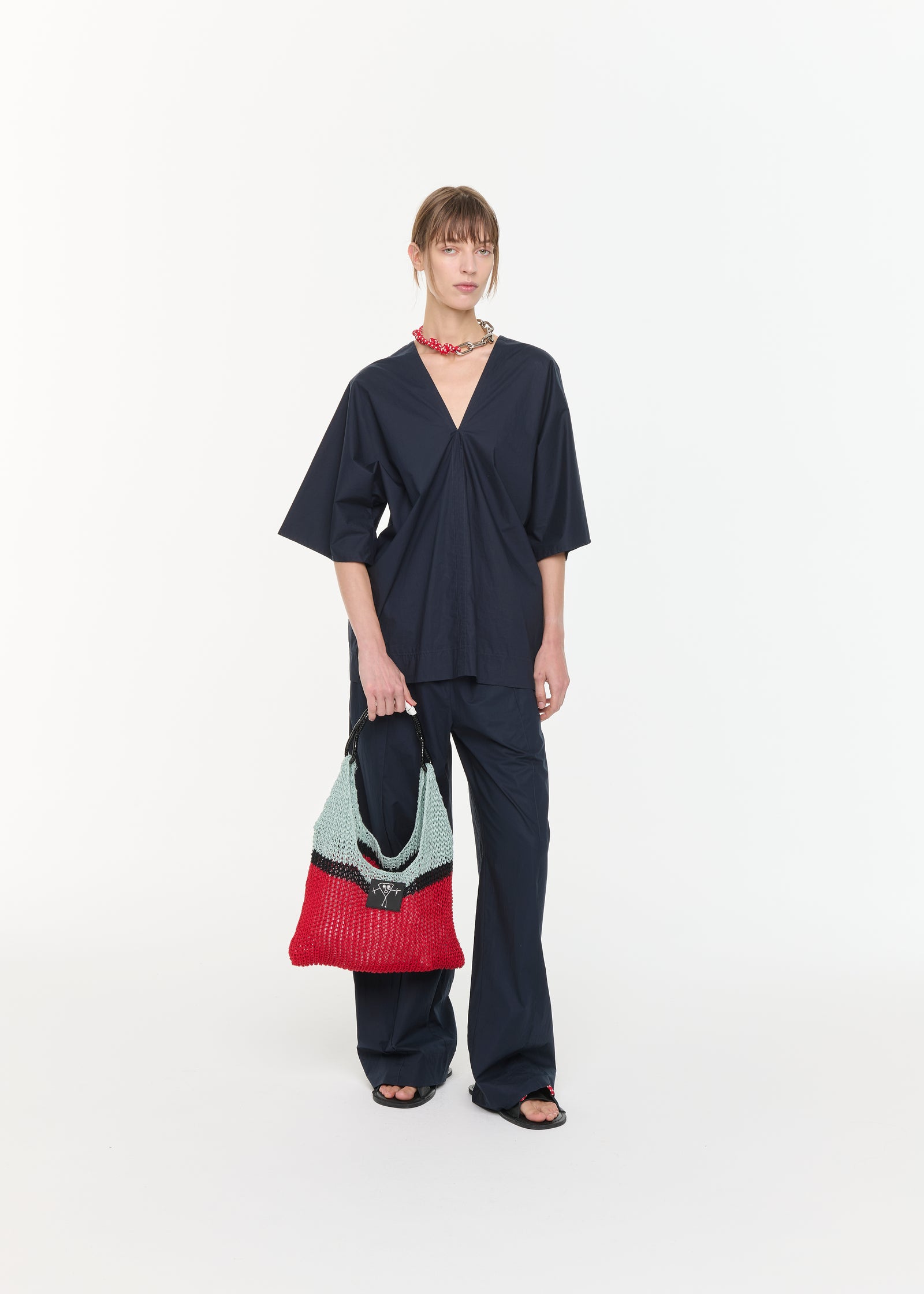 BLUSA CON SCOLLO A V