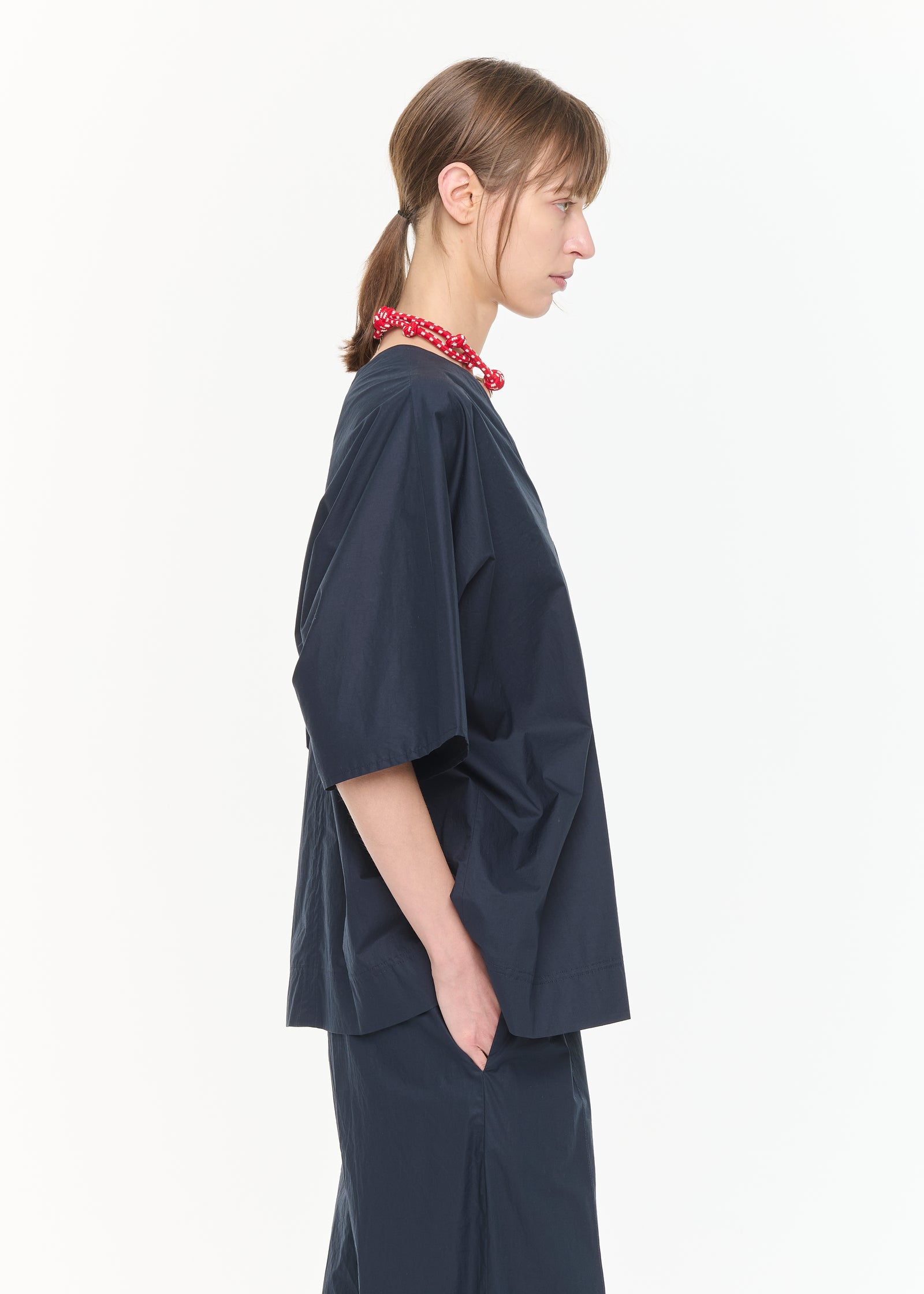 BLUSA CON SCOLLO A V