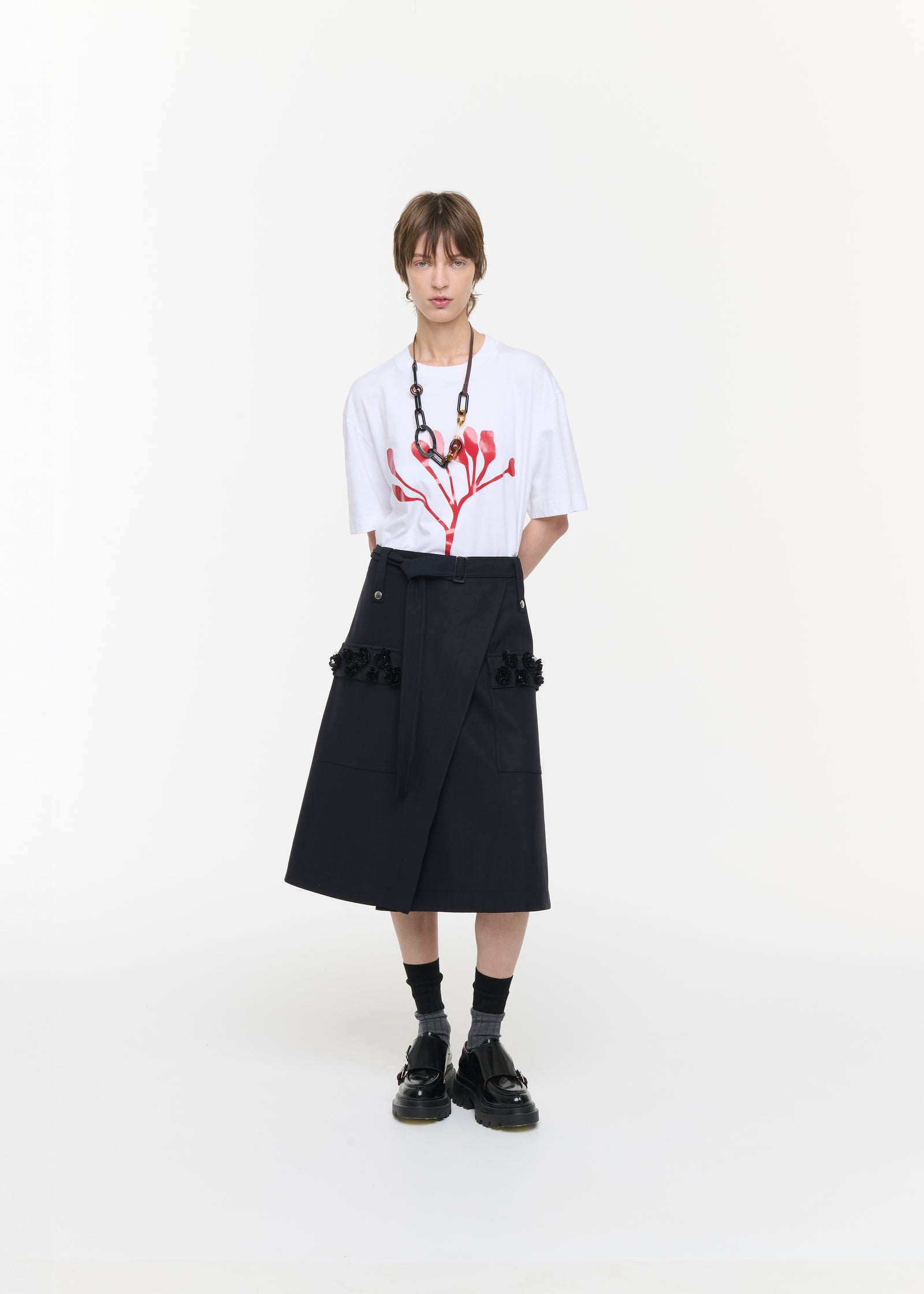 BLUE WRAP SKIRT WITH EMBROIDERED POCKETS