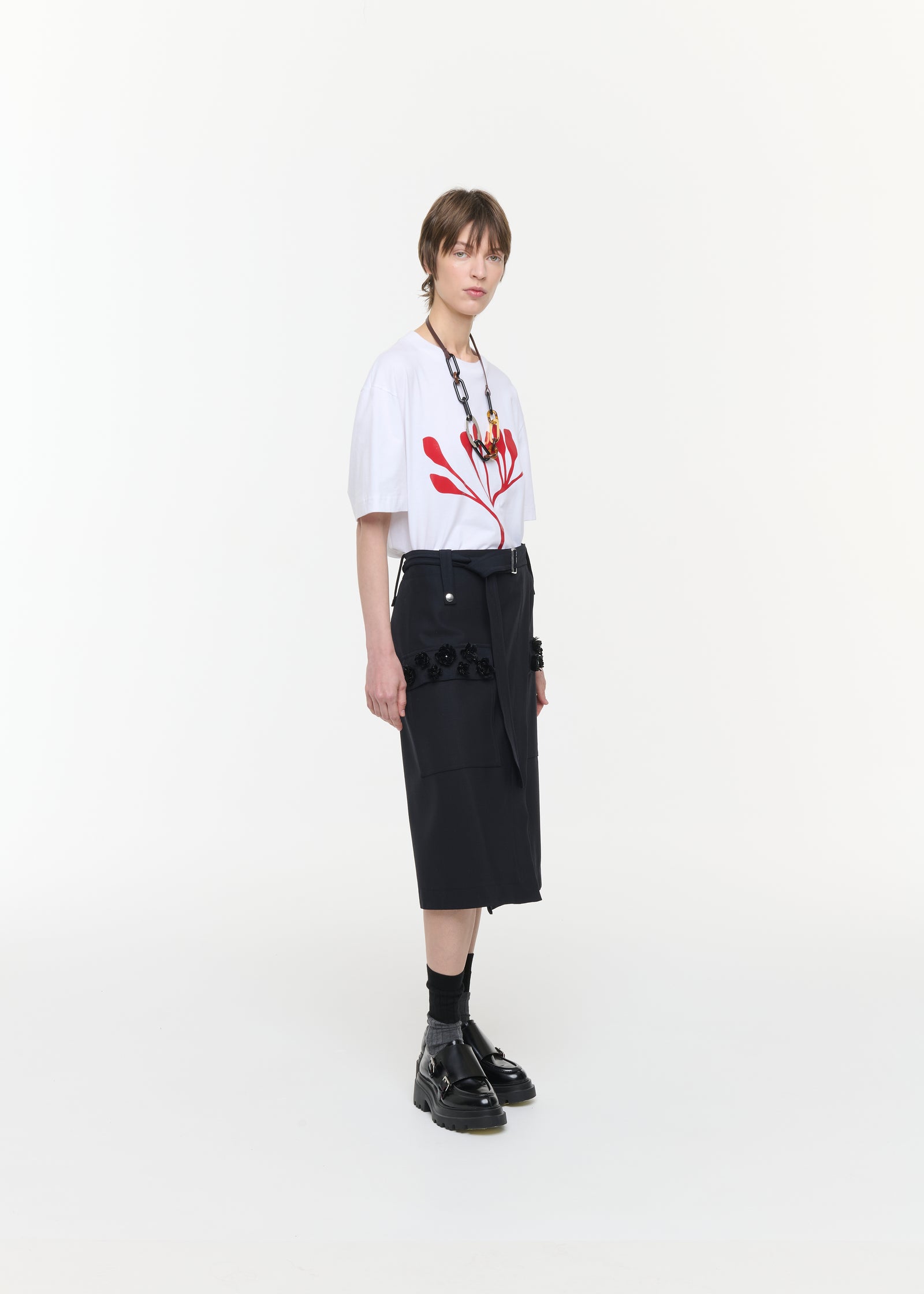BLUE WRAP SKIRT WITH EMBROIDERED POCKETS