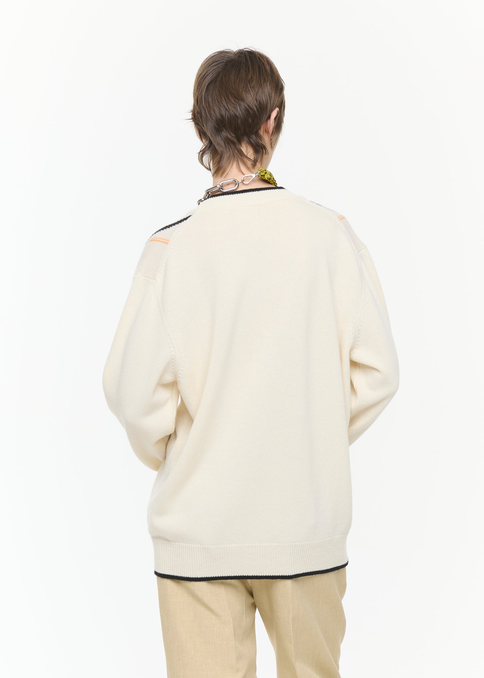 CREME ARGYLE V-NECK SWEATER