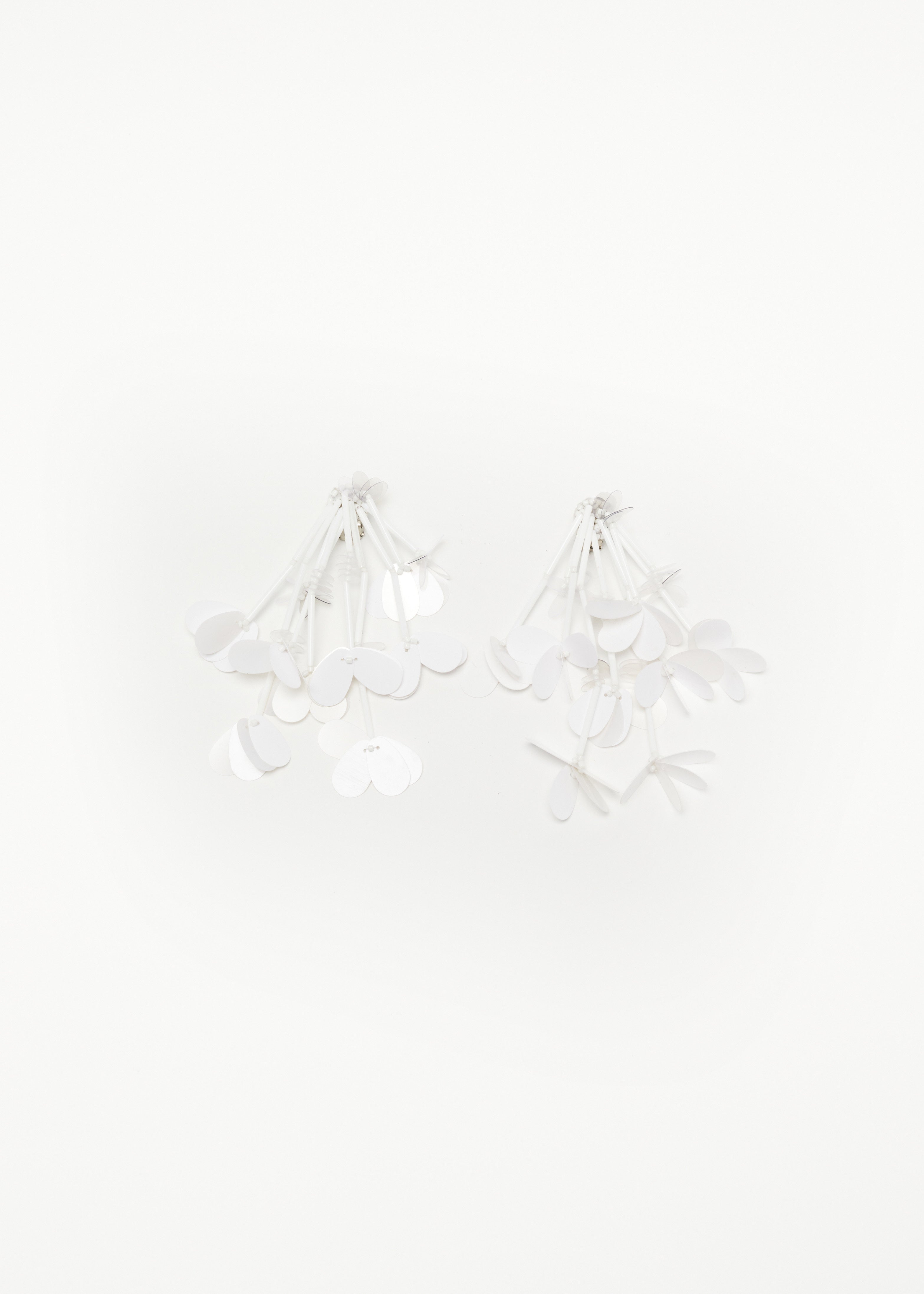 WHITE CLIP-ON EARRING WITH SEQUIN FRINGES