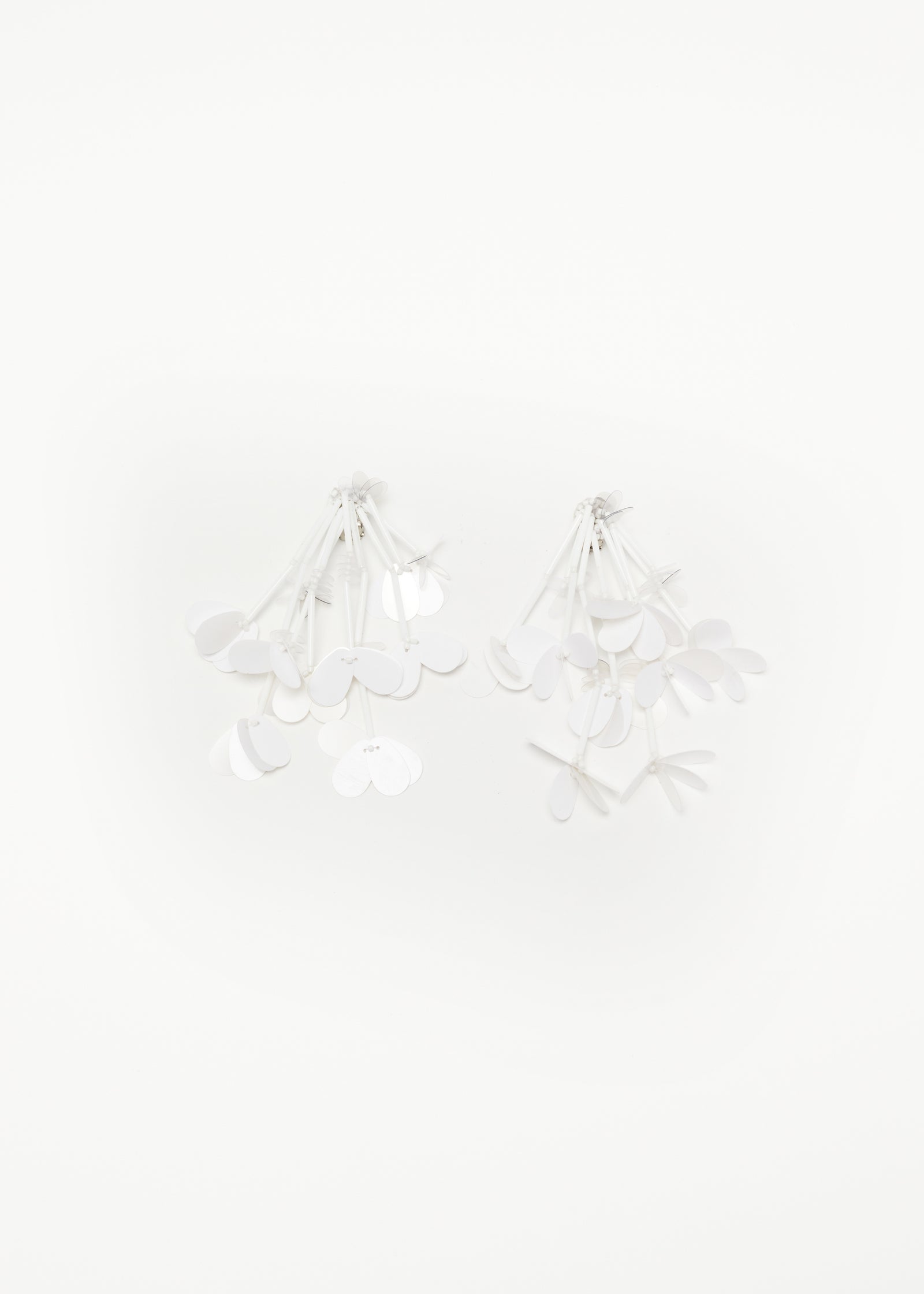 WHITE CLIP-ON EARRING WITH SEQUIN FRINGES